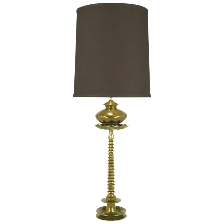 French Moderne Solid Brass Segmented Table Lamp: Solid cast brass French moderne segmented table lamp. Converted and rewired to US electrical specifications. Sold sans shade. Measures: 44". Condition: Alterations: Original Condition Unaltered Imperf