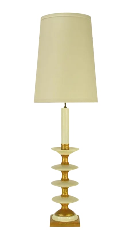 50" Water Gilt & White Lacquer Four-Tier Table Lamp: Monumental 50" tall table lamp. The body is comprised of alternating red primed gilt wood spacers and white lacquered resin discs finishing with a white lacquered resin bobeche. Large candle stick