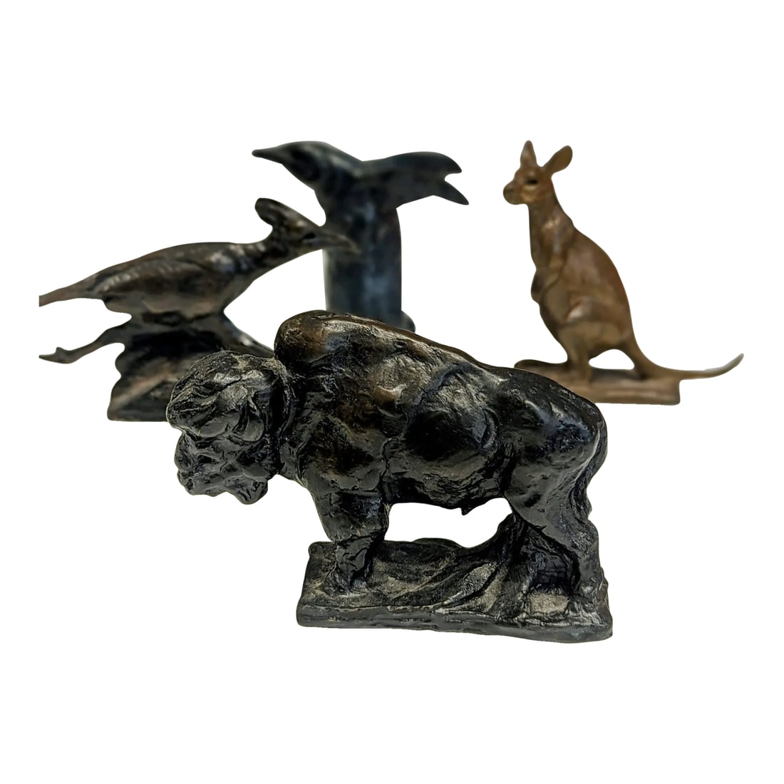 Dan Ostermiller Bronze Animals: Originally crafted as part of his studio explorations or limited-edition series, these cast bronze miniatures are rich with expression, from the curved hunch of the penguin to the lean stretch of the