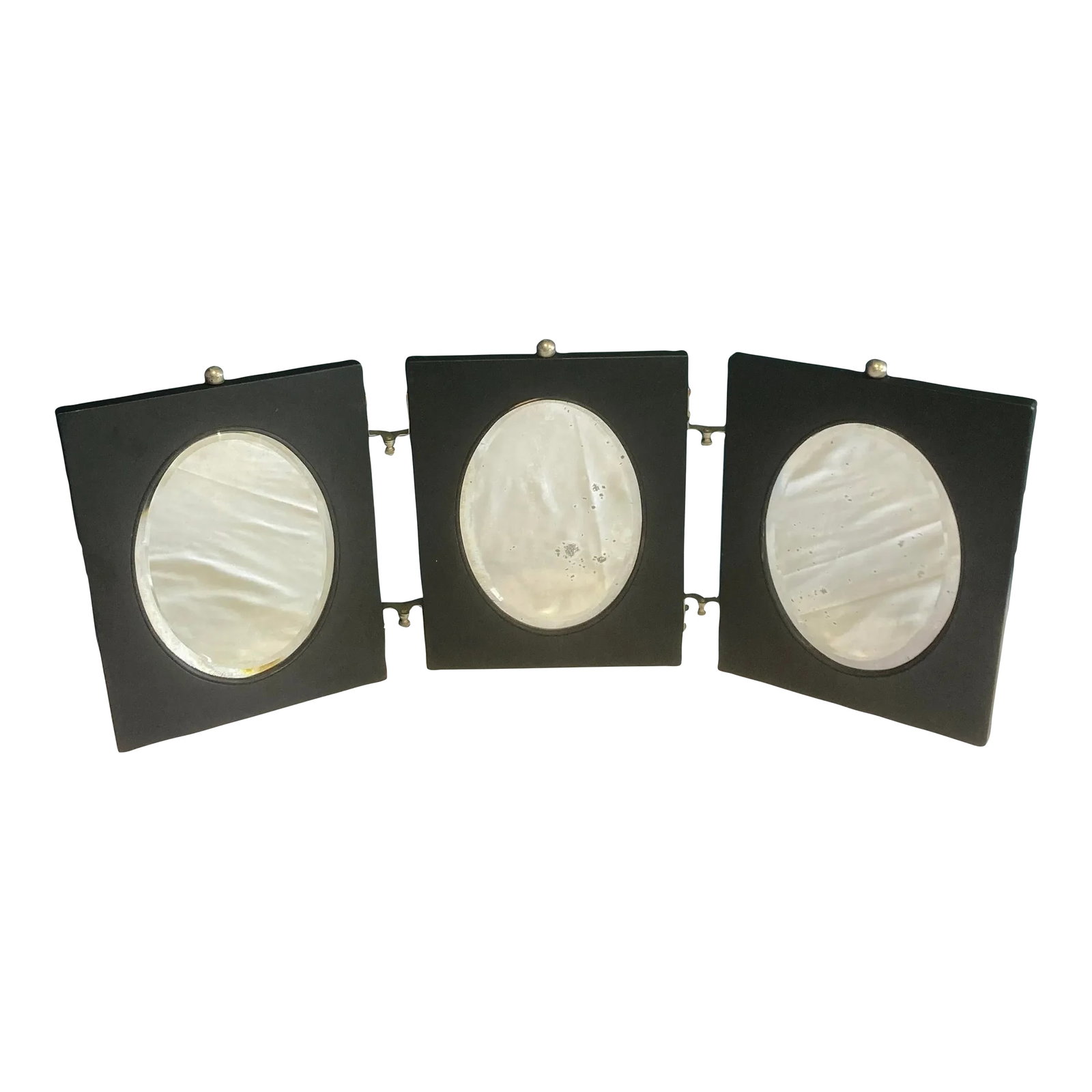 Early 20th Century Art Deco Folding Triple Mirror With Black Frame: Perfect for a tabletop or vanity. The metal hinges fold easily to allow for storage. Condition: Alterations: Original Condition Unaltered Imperfections: Some Imperfections Condition Notes: Mirrors