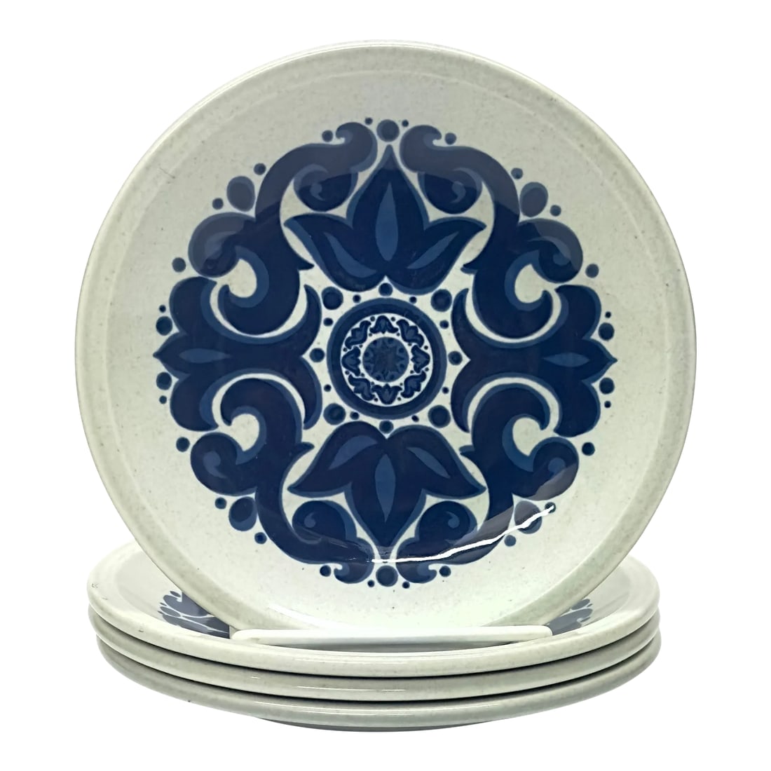 Mid 20th Century Chunky Graphic Blue & White Toledo Design Side Plates by Wedgwood - Set of 4: White and blue side plates, group of 4. This set of four ceramic bread plates were crafted by Wedgwood in England, during the mid-20th century. These plates are in the Toledo design with a cream base