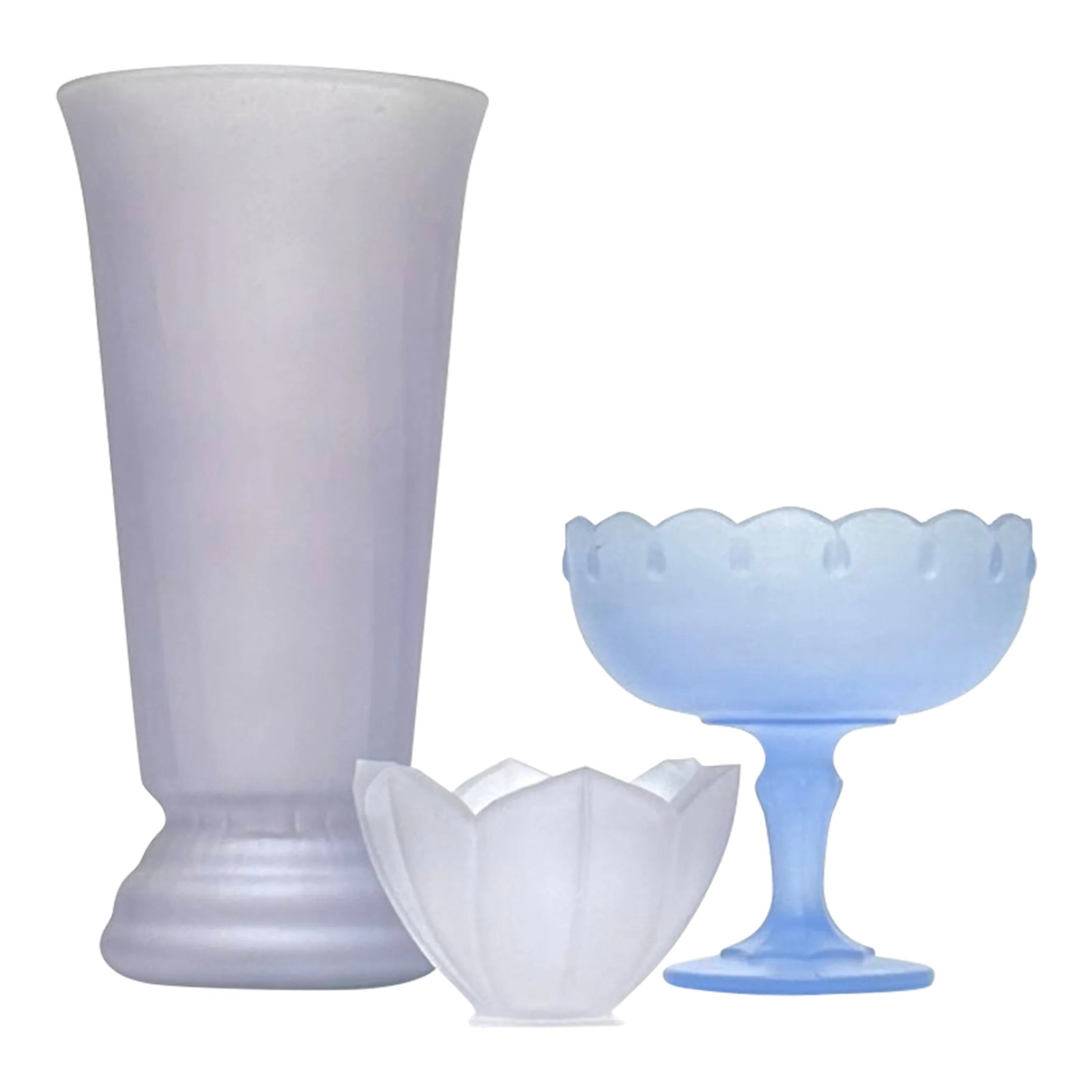 Blue and Lavender Glass Vessel Curation - Group of 3: Assorted matte blue and purple vessels, group of 3. A delicate group of matte cornflower blue and lavender purple glass vessels of assorted shapes and sizes. Shortest: 4"H Tallest: 7"W x 14.25"H
