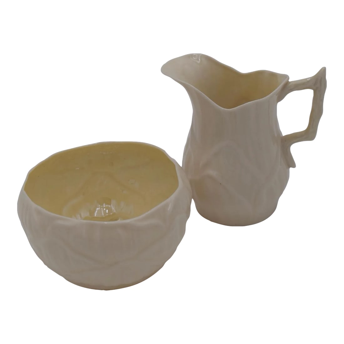 Vintage Lily Belleek Creamer and Sugar Set- 2 Pieces: This little creamer and sugar set is delicate and lovely. The Ivory lily pattern is a perfect example of simple elegance. Perfect for a brunch table or after dinner coffee service. This set is in