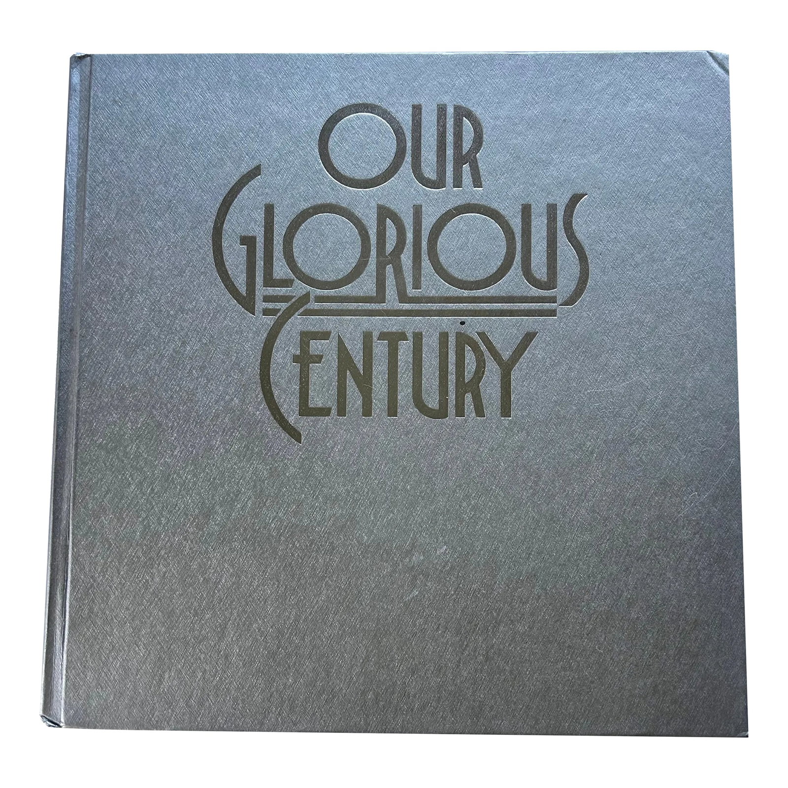 Our Glorious Century Book, Hardcover, 1995: This book with it't gray and silver art deco cover is filled with fun facts and essential information about the world of the 20th Century. "Our Glorious Century" is a hail and farewell to the most