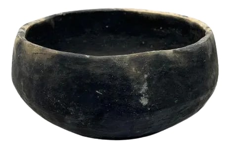 Gafsa Clay Bowl: This Gafsa clay vessel hails from Tunisia, specifically the town of Gafsa known for its pottery craftsmanship. This traditional vessel is crafted from locally sourced clay, showcasing the region's