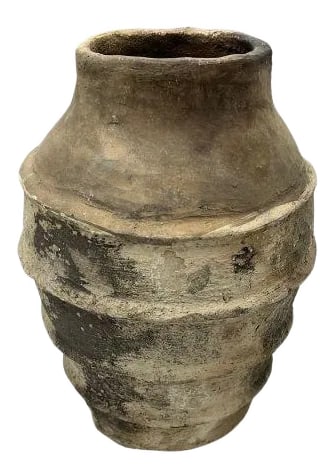 Gafsa Clay Vessel: This Gafsa clay vessel hails from Tunisia, specifically the town of Gafsa known for its pottery craftsmanship. This traditional vessel is crafted from locally sourced clay, showcasing the region's