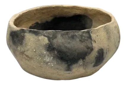 Gafsa Clay Bowl: This Gafsa clay vessel hails from Tunisia, specifically the town of Gafsa known for its pottery craftsmanship. This traditional vessel is crafted from locally sourced clay, showcasing the region's