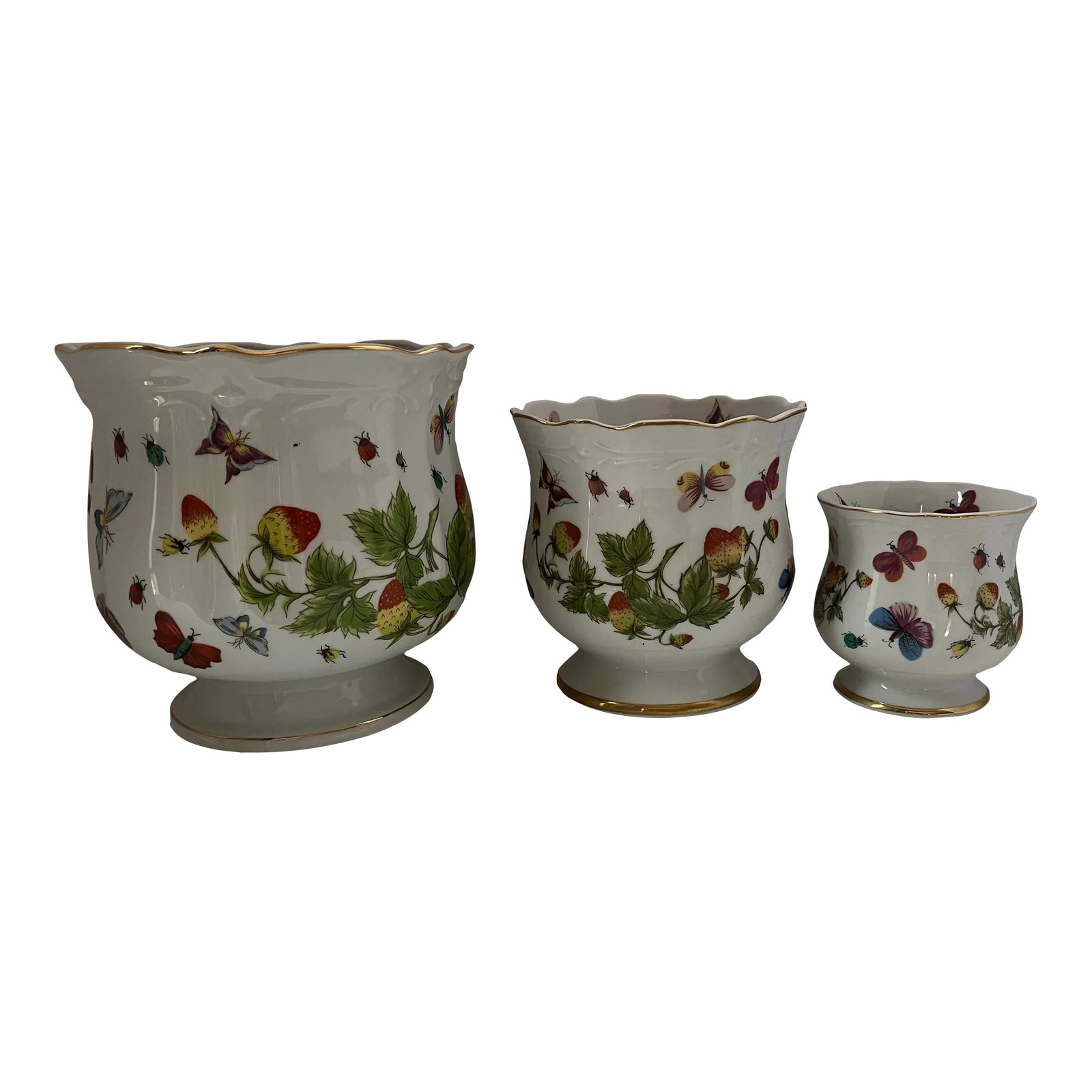 Set of Three Vintage Lenwile Ardalt China Springtime Butterfly Pattern Base Cachepot Base Planter: A delightful vintage set of three porcelain cachepots by Lenwile Ardalt, produced in Japan and decorated with a charming garden motif of strawberries, butterflies, and ladybugs. Each piece features a