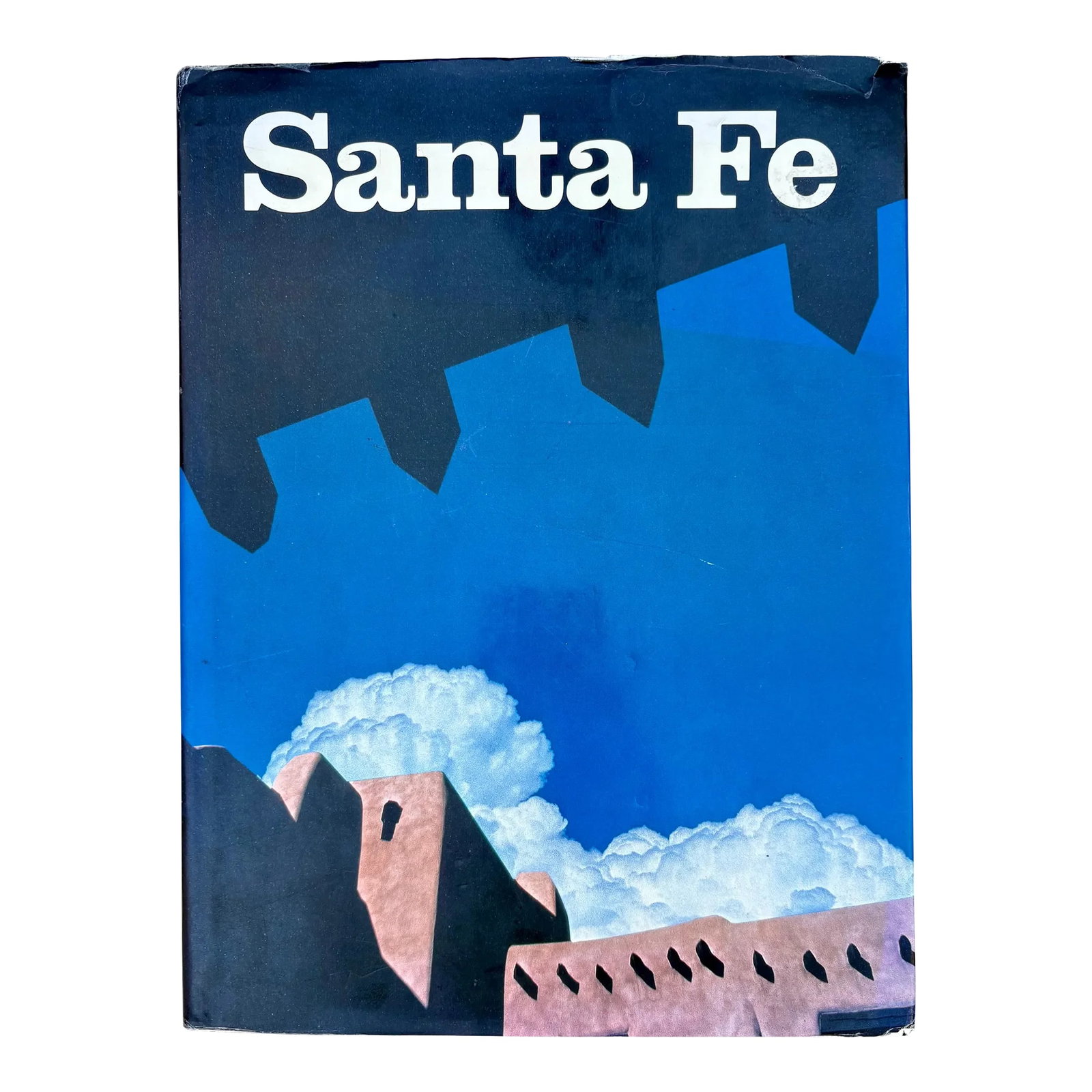 Santa Fe First Edition Hardcover, 1987 by Lisl and Landt Dennis: "...the moment I saw the brilliant, proud morning sine high over the deserts of Santa Fe, something stood still in my soul, and I started to attend." - D.H. Lawerence "SANTA FE is a photographic essay