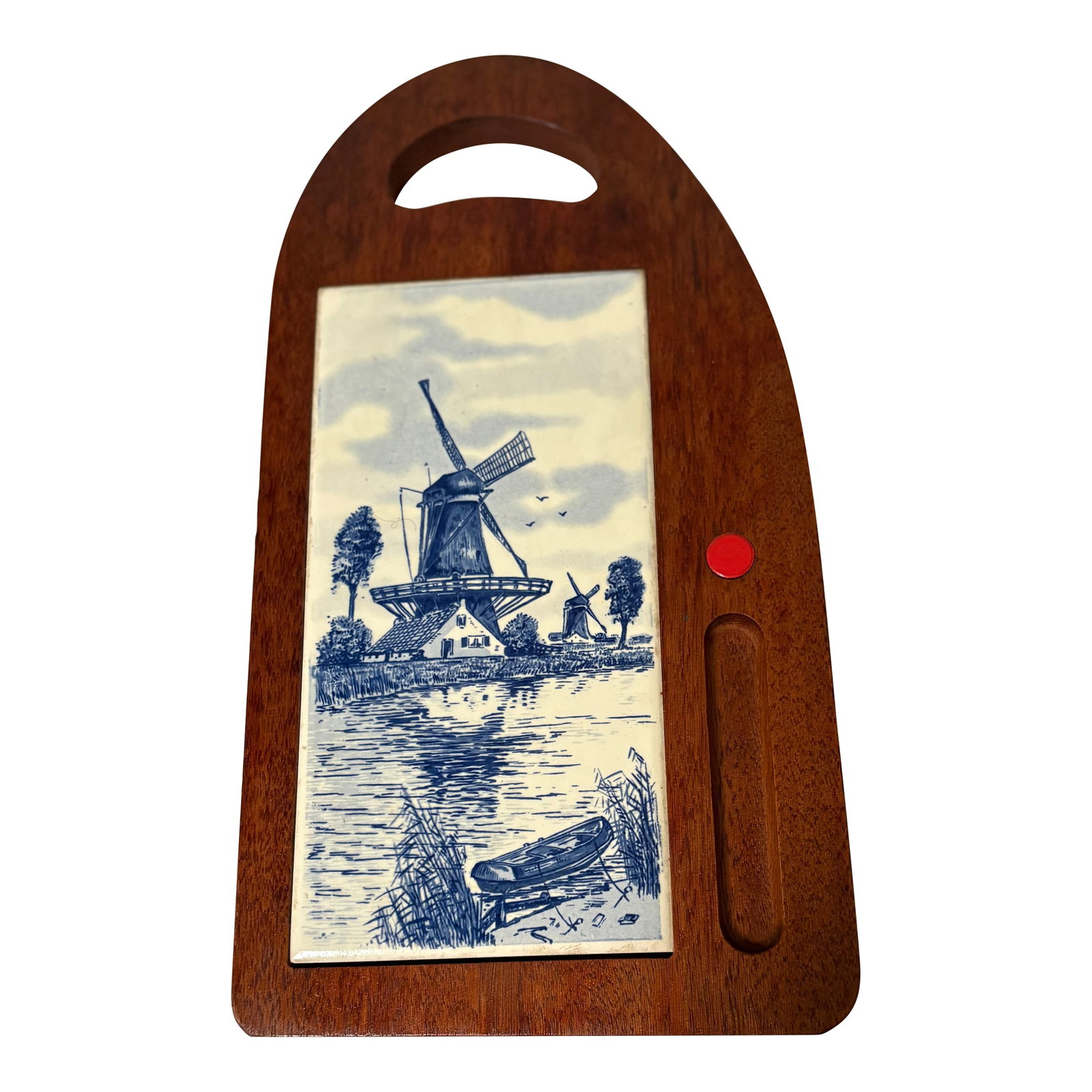 Vintage Delft Tile and Wood Cheeseboard: This fully functional mid-twentieth century tile and wood cheeseboard is handsome enough to hang on a wall thanks to the classic blue and white Delft tile embedded in the wood board. Featuring a