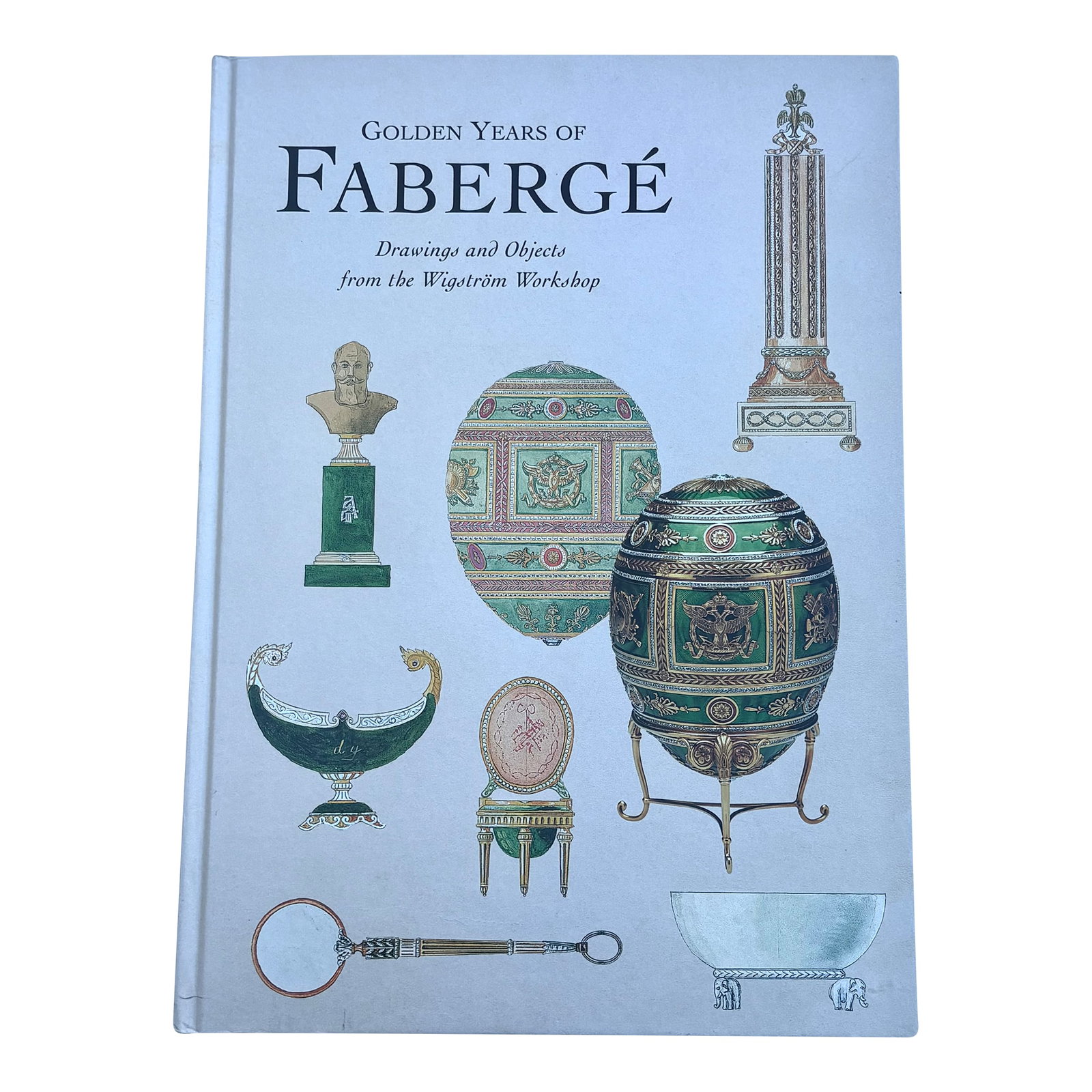 "The Golden Years of Faberge: Drawings and Objects From the Wigstrom Workshop" 2000, First Edition: This amazing book contains the only surviving working designs from the Faberge workshop. The book, with a hardback cover, presents an album of drawings from the workshop of Henrik Wigstrom, who was