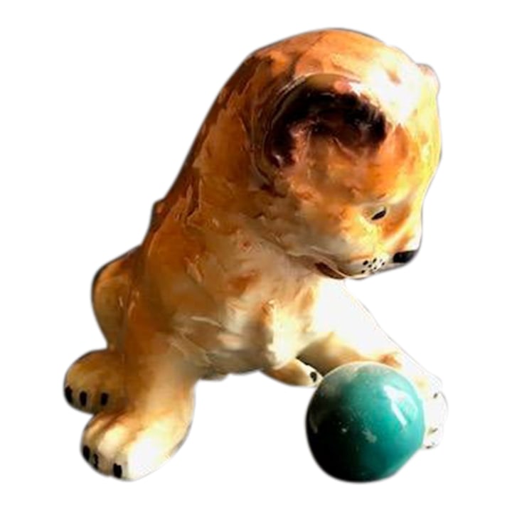 Mid-Century Leopard Kitten Porcelain Figurine, Germany: Adorable Mid-20th Century figurine of leopard kitten playing with green ball. Made of porcelain. Stamped "Germany" and engraved "C W 38" on bottom. Condition: Alterations: Original Condition Unaltered