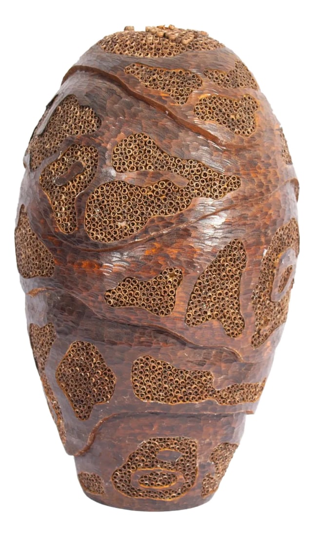 Lloyd Cheney Signed 2007 Sculptural Wooden Vase: A 2007 sculptural wooden vase by the American woodworker Lloyd Cheney. The vase consists of wood and applied natural elements which make a curving organic pattern across its body. The underside is sig