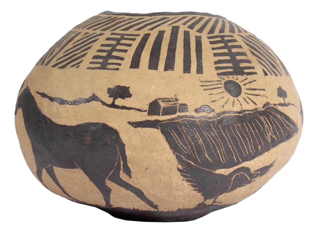 Marilyn Andrews 1976 Signed Studio Pottery Vessel: A 1976 studio pottery vessel by the American ceramic artist Marilyn Andrews (1942-2019). This whimsical vessel has a sgraffito design of a figure leading a horse through the countryside. The vessel