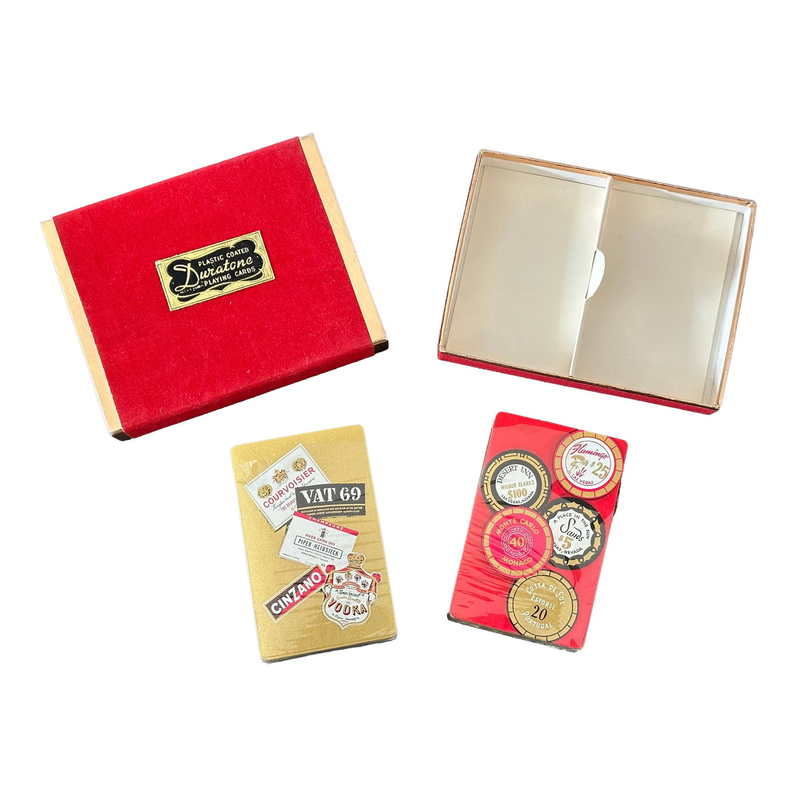 Vintage Mid Century Casino Bar Double Playing Card Set: Made by Duratone in the 1960s, this vintage double deck set of playing cards has an international casino and luxury liquor brand motif. Display the fun and funky vintage playing cards in a game room