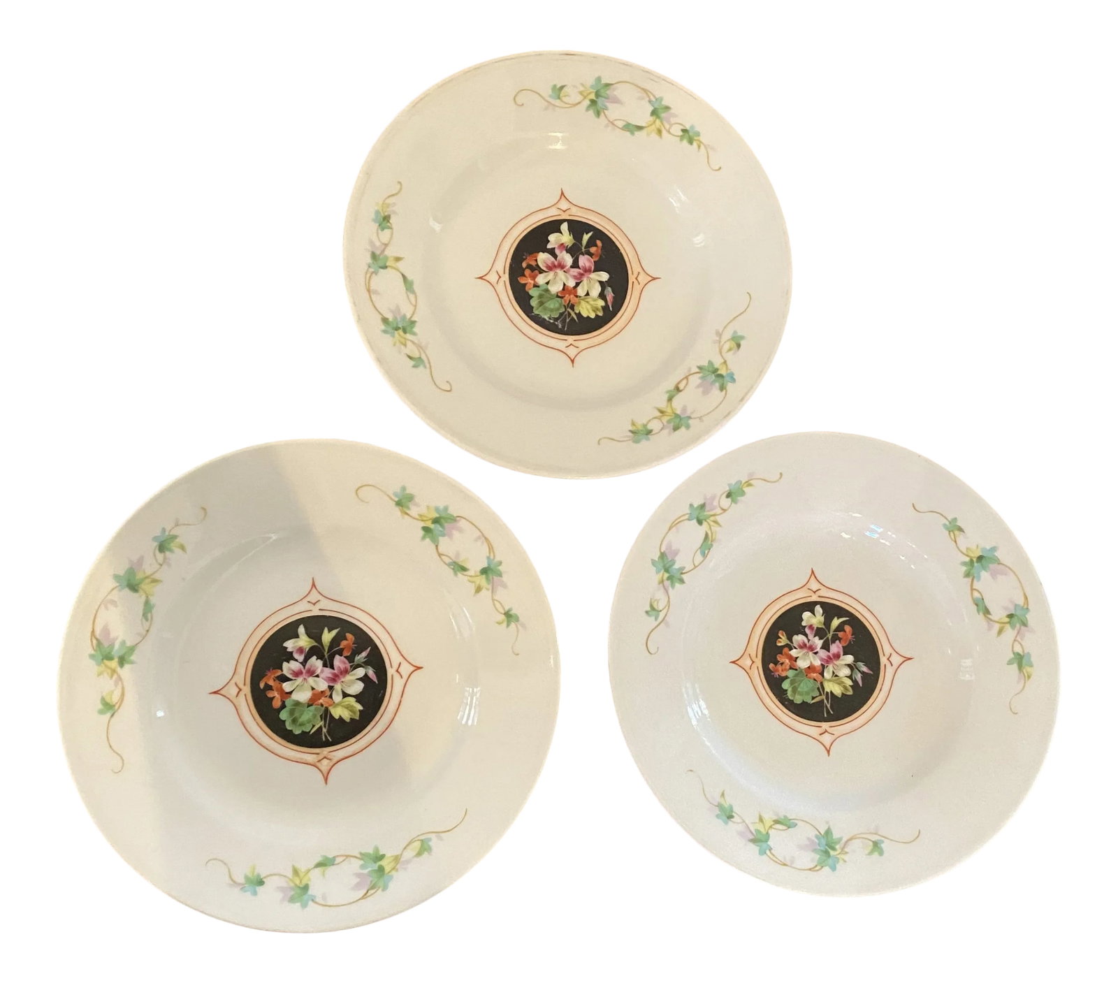 Antique Late 19th Century Floral Plates - Set of 3: Lovely set of three hand painted cabinet plates with a central floral design on black ground in a central cartouche with three stylized vines on rim, no maker Mark is evident. Condition: Alterations: 