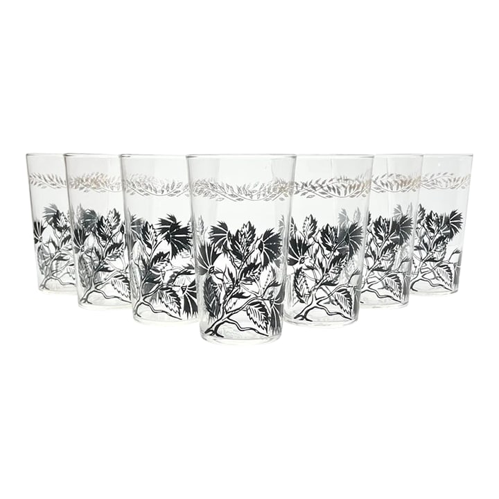 1950s Federal Glass, Set of 7 Black Flower & Gold Leaf Highball Tumbler Glasses: 1950s Federal Glass, Set of 7 Black Flower & Gold Leaf Highball Tumbler Glasses No chips, cracks, or fleabites. Gold laurel leaf motifs show wear. Comes with age and use. See pictures. Height 4 3/4"