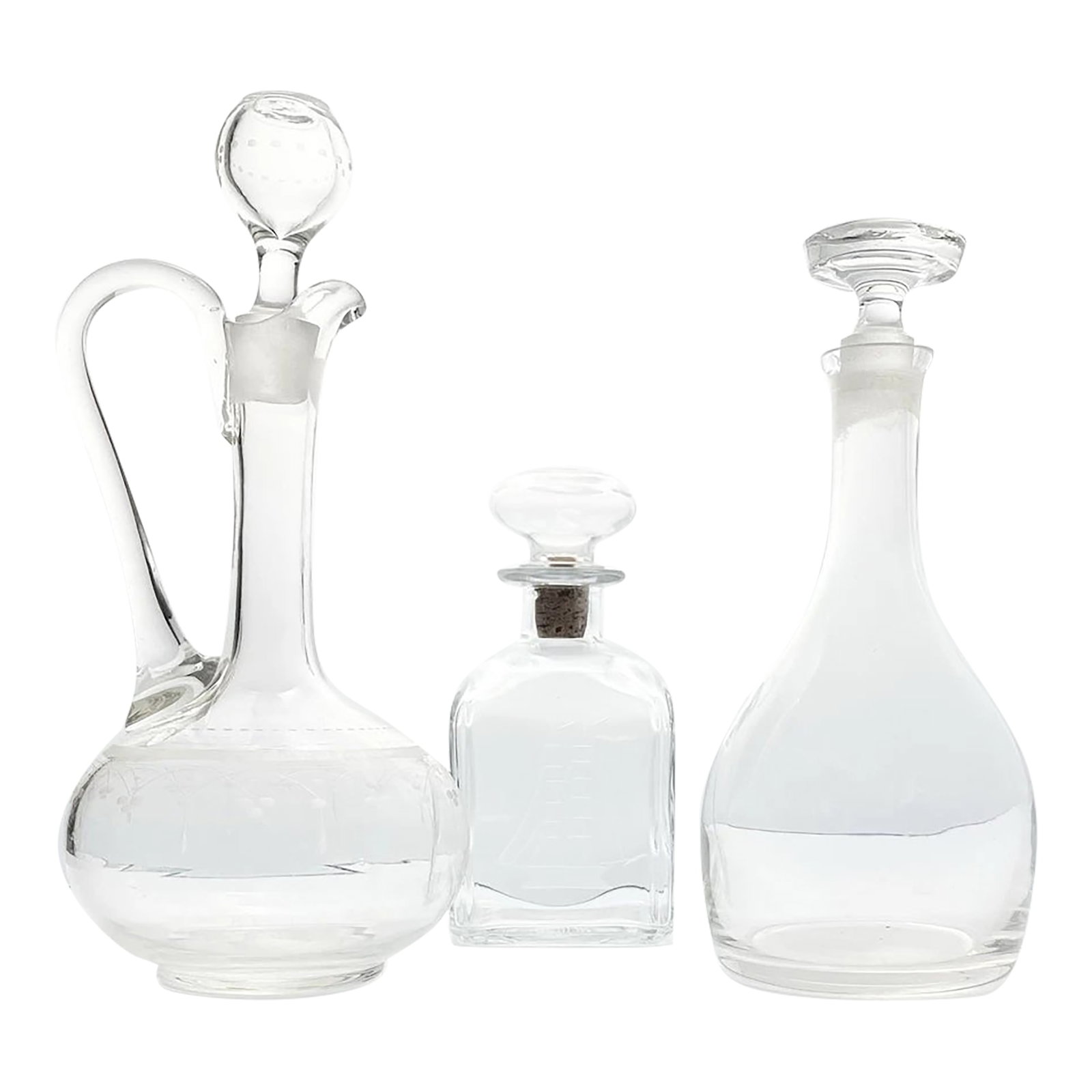 1960s Vintage Set of 3 Glass Etched Spirits Liquor Wine Decanters: 1960s Vintage Set of 3 Glass Etched Spirits Liquor Wine Decanters Set, Barware Good vintage condition. Small fleabite chips on bottom of stoppers. No chips or cracks to body of decanters. Interior