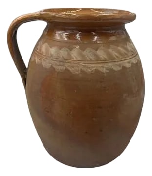 Antique Hungarian Folk Art Pottery: This antique one-handle terra cotta vessel from Hungary is a wonderful addition to any Farmhouse decor. The rustic pottery showcases a subtle hand-painted Hungarian Folk Art design peaking through the