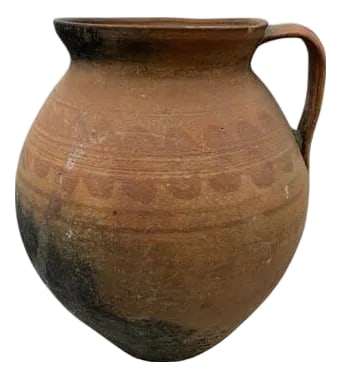 Antique Terracotta Vessel: This antique one-handle terra cotta vessel from Hungary is a wonderful addition to any Farmhouse decor. The rustic pottery showcases a subtle hand-painted Hungarian Folk Art design peaking through the