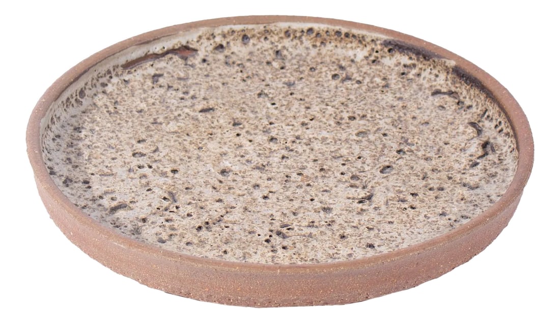 Studio Pottery Lava Glaze Charger Signed by Artist Edna Arnow: A studio pottery charger by the American artist Edna Arnow (1921-2013). Signed to the underside, the charger has a textural lava glaze in a light brown color. Edna Arnow was a self-taught