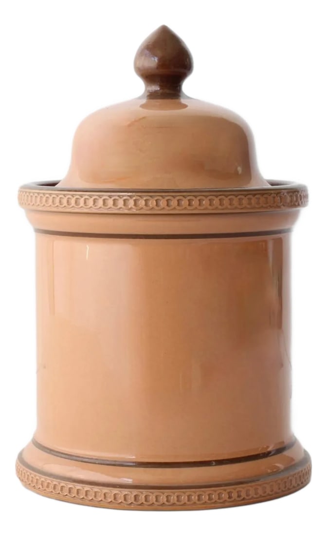 1880s Langley Ware Apothecary Canister: Made in the late 1880s by Langley Ware, this half-pint apothecary jar features a warm caramel glaze and a finely detailed finial lid. Known for its durability, Langley Ware pottery was often used for