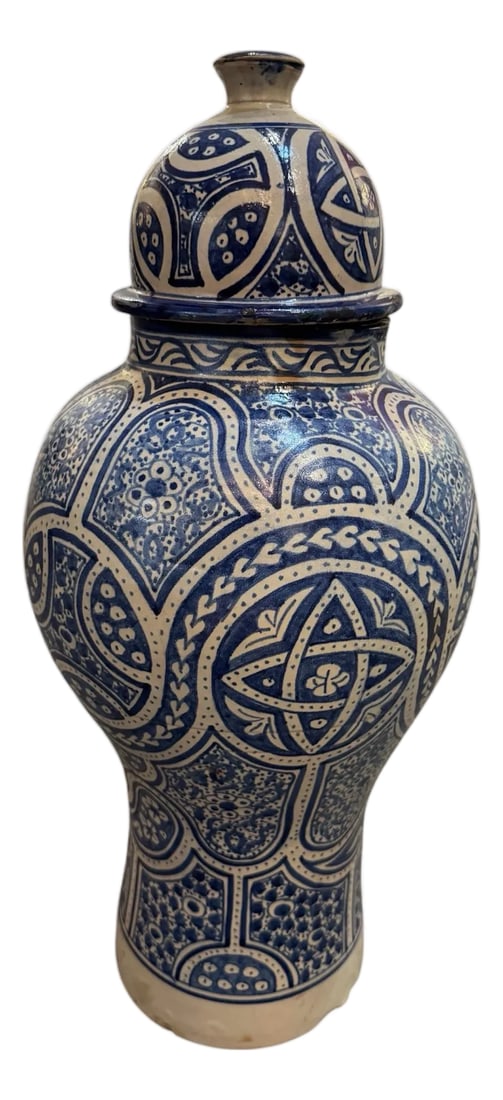 Large 1990s Handmade Ginger Jar: Bring authentic Moroccan charm to your home with this stunning handmade ginger jar. Featuring a bold blue and white design, this large ceramic piece showcases intricate patterns inspired by