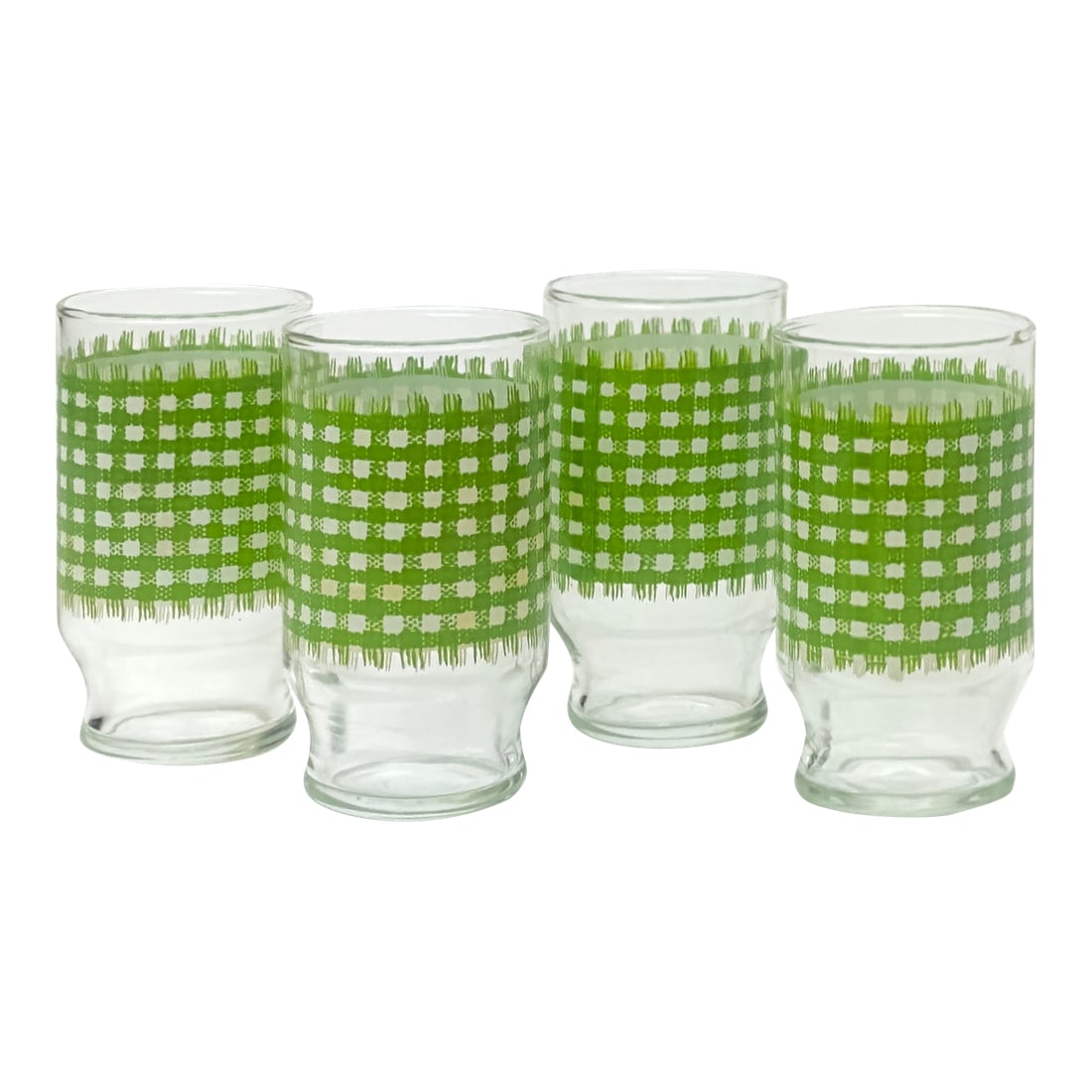 Vintage Juice Glasses With Green Checkered Cloth Motif Attributed to Anchor Hocking - Set of 4: Green & white glasses, group of 4. A set of clear glass cups featuring a lime-green and white gingham band, made by Anchor Hocking for their 'Fire King' line. Height: 4" Width: 2.25" Condition: