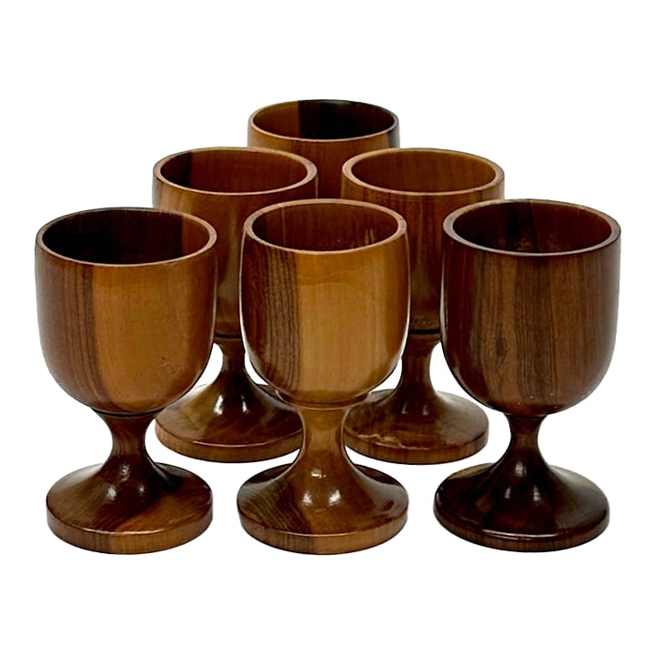 Mid Century Modern Stemmed Rosewood Shot Glasses - Set of 6: Brown wooden shot glasses, group of 6. An elegant and unique set of handmade mid-century modern rosewood stemmed shot glasses or goblets. Height: 3"H Width: 1.75"W Condition: Alterations: Original Con