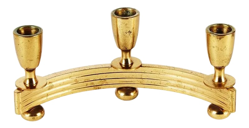 1950s Brass Crescent 3 Candle Candelabra: Heavy brass candelabra from the mid-century era. Shaped like a crescent; holds 3 candles. CONDITION Good vintage condition with signs of wear and use consistent with age. We do not clean brass items,