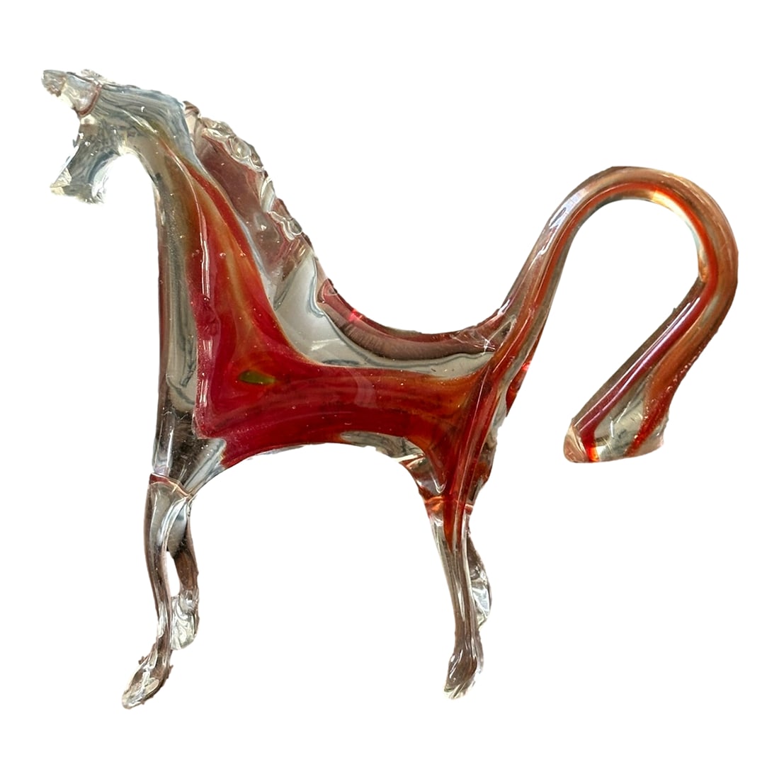 Mid 20th Century Hand Blown Murano Style Glass Horse Figurine With Red Core: Hand Blown Murano Style Glass Horse Figurine With Red Core This vintage hand-blown glass horse features a striking red interior encased in clear glass, sculpted with a lifted tail and stylized head.
