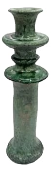 1970s Moroccan Tamegroute Glazed Candlestick Holder Moroccan Tamegroute Glazed Candlestick Holder: A Moroccan Tamegroute glazed candlestick holder is a handcrafted piece made in the historic pottery village of Tamegroute in southern Morocco. These holders are shaped from local clay and finished