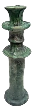 Moroccan Tamegroute Glazed Candlestick Holder: A Moroccan Tamegroute glazed candlestick holder is a handcrafted piece made in the historic pottery village of Tamegroute in southern Morocco. These holders are shaped from local clay and finished