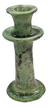 Moroccan Tamegroute Glazed Candlestick Holder: A Moroccan Tamegroute glazed candlestick holder is a handcrafted piece made in the historic pottery village of Tamegroute in southern Morocco. These holders are shaped from local clay and finished