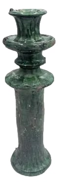 1970s Moroccan Tamegroute Glazed Candlestick Holder: A Moroccan Tamegroute glazed candlestick holder is a handcrafted piece made in the historic pottery village of Tamegroute in southern Morocco. These holders are shaped from local clay and finished