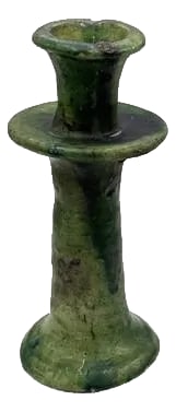 1970s Moroccan Tamegroute Glazed Candlestick Holder: A Moroccan Tamegroute glazed candlestick holder is a handcrafted piece made in the historic pottery village of Tamegroute in southern Morocco. These holders are shaped from local clay and finished