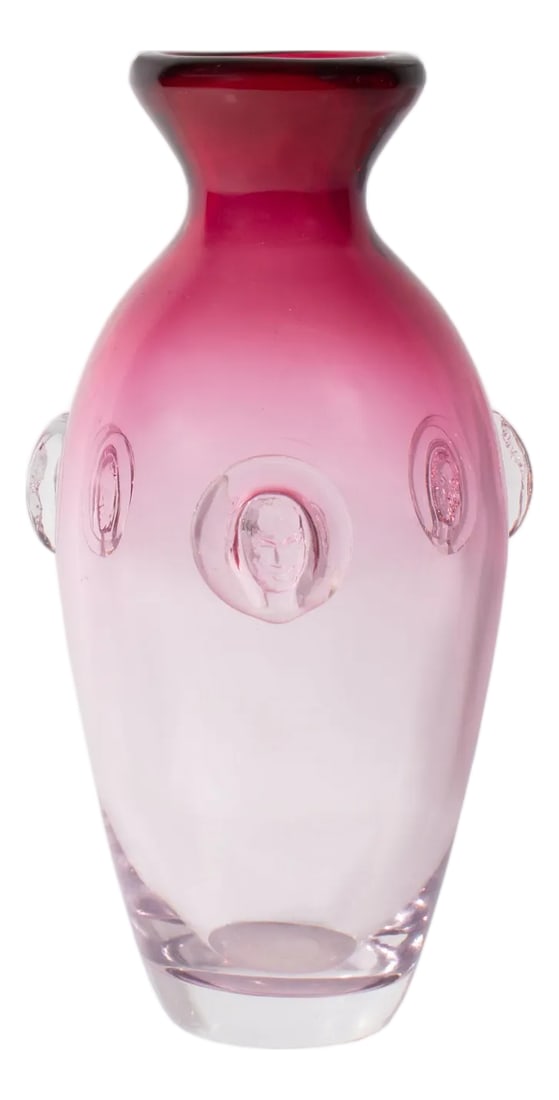 Sergio Pagnin Chalet Rubina Glass Vase: A rubina glass vase designed by Italian-Canadian artist Sergio Pagnin for the Chalet. This vase transitions from cranberry red to a pale pink and features three face prunts to the exterior.