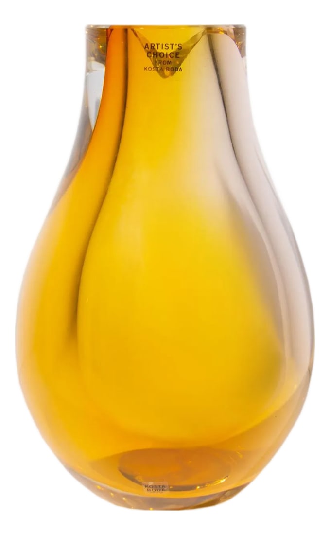 Kosta Boda "Opus" Glass Vase by Goran Warff: A glass "Opus" vase designed by Swedish glass artist and designer Goran Warff (born 1933) for Kosta Boda. Made in Sweden, this vase is made from a vibrant orange glass and has a teardrop shape with a