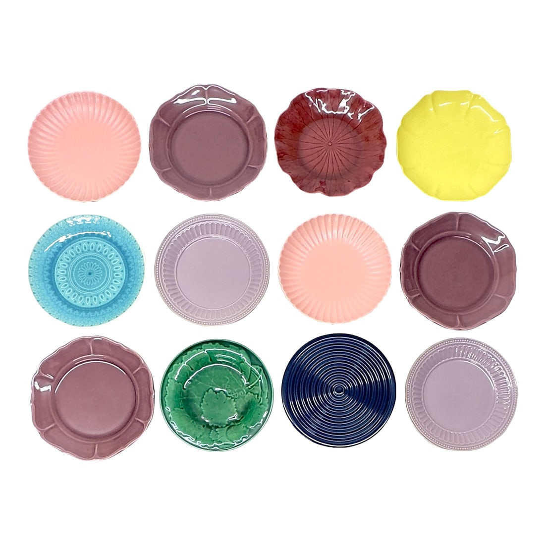 All Over Color Jewel-Toned Textured Ceramic Side Plate Curation - Group of 12: Mixed jewel-tone decorative plates, group of 12. This eclectic set of decorative side plates features a variety of solid jewel tones, textures, and patterns. Including brands such as Poppytrail,