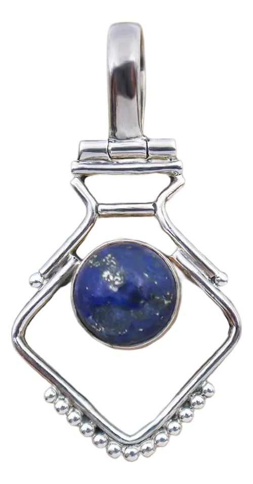 Vintage Modern Lapis Lazuli Sterling Pendant: Vintage artesian crafted pendant with a modern sterling silver structure and natural lapis lazuli gemstone at its center. Regarded throughout history for its blue hue and golden flecks. Lapis lazuli