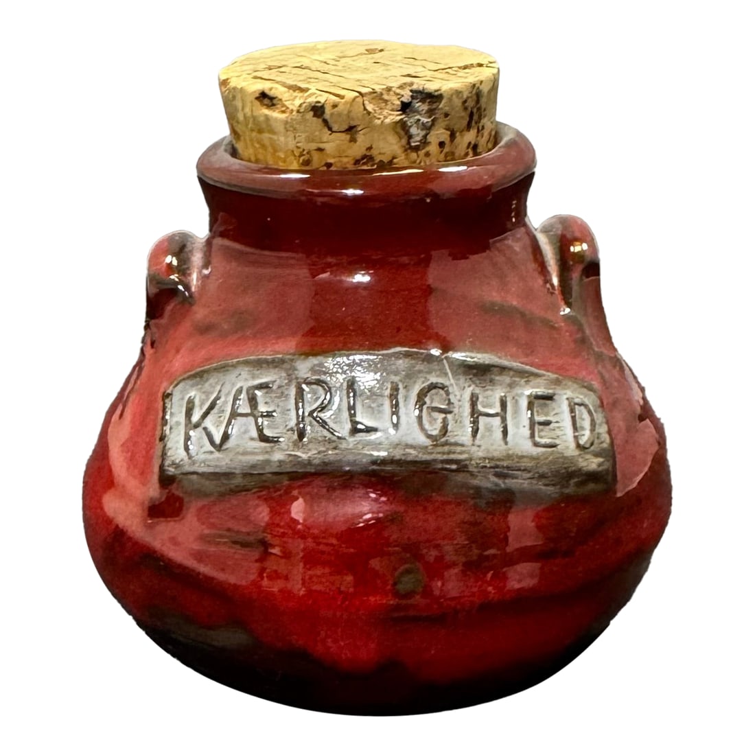 VTG Frelica Danmark Red Studio Pottery Kaerlighed (Love) Jar & Cork Danish MCM: The VTG Frelica Danmark Red Studio Pottery Kaerlighed (Love) Jar & Cork is a vintage piece of Danish mid-century modern stoneware. Handmade with a red color and impressed backstamp, this art pottery s