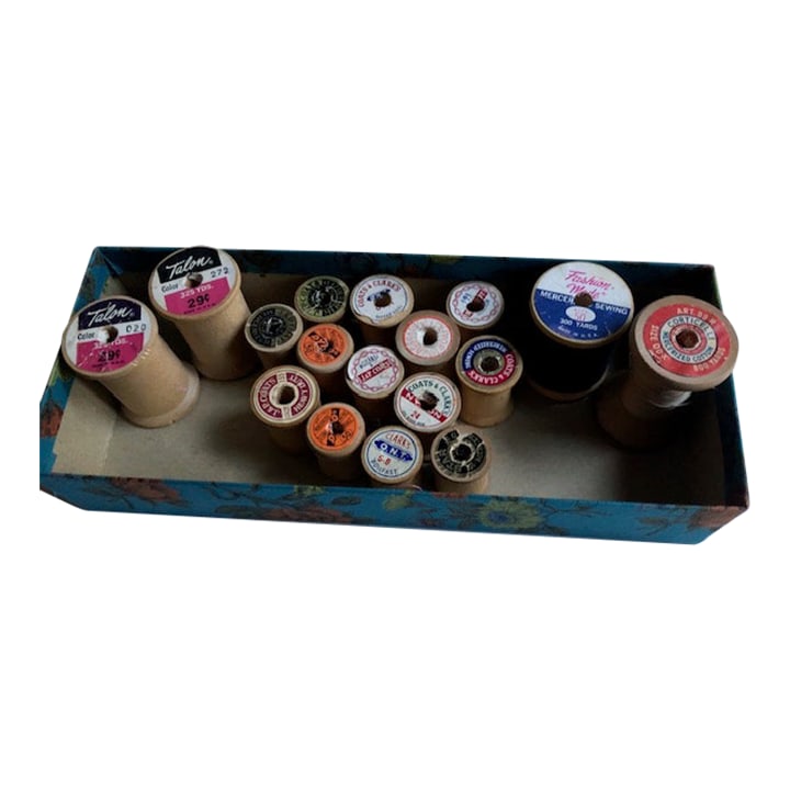 Mid-Century Collection of Wooden Thread Spools Bobbins: A collection of wooden spools/bobbins for thread. Various sizes and makers. Stored in a pretty fabric-covered rectangular box. Condition: Alterations: Original Condition Unaltered Imperfections: Some