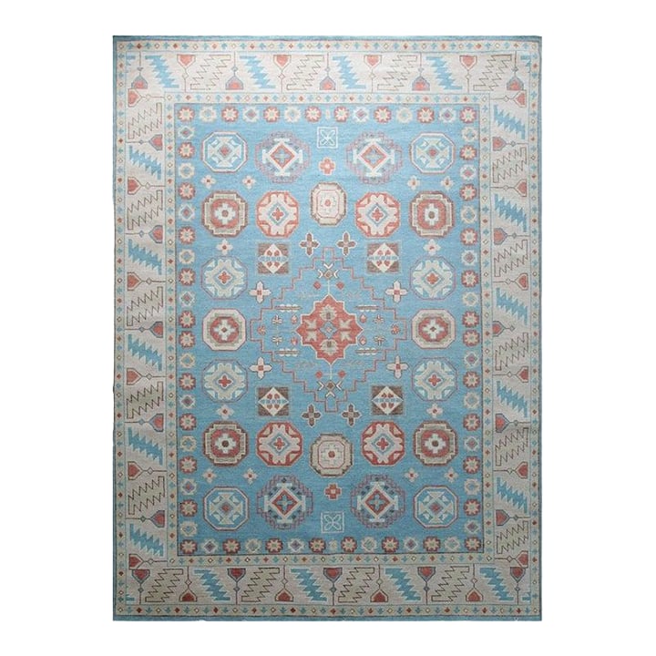 9x12 Blue Hand-Knotted Wool Octagonal Medallions Tribal Modern Carpet Rug: This blue wool rug features a traditional Oushak style interpreted through expert craftsmanship. Hand knotted in India, the rug utilizes a pile weave construction that creates a solid and substantial 