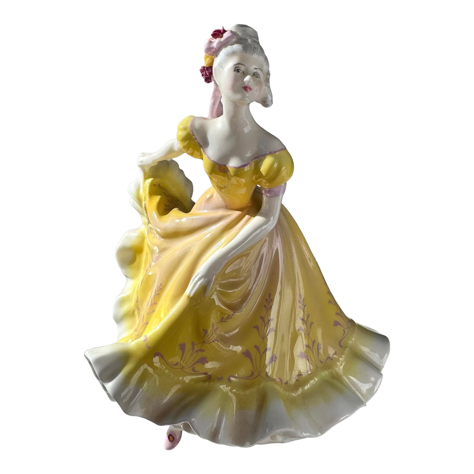 Mid 20th Century Royal Doulton Figurine ~ "Ninette" ~ Hn 2379: "Ninette" (H.N. 2379), introduced by Royal Doulton in 1960, is a finely modeled bone china figurine from the H.N. series. The piece depicts a young girl in mid-dance, her gown flowing with dynamic