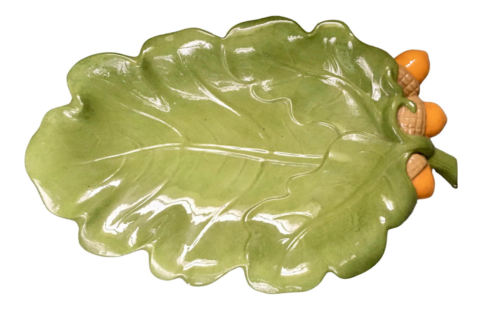 Vintage 1960s Green Leaf & Acorn Ceramic Dish: A botanically inspired vintage serving tray shaped like a fresh green leaf with flowing edges & 3 orange acorns with light brown tops. This dish adds a whimsical twist to an hor d'oeuvres table or a