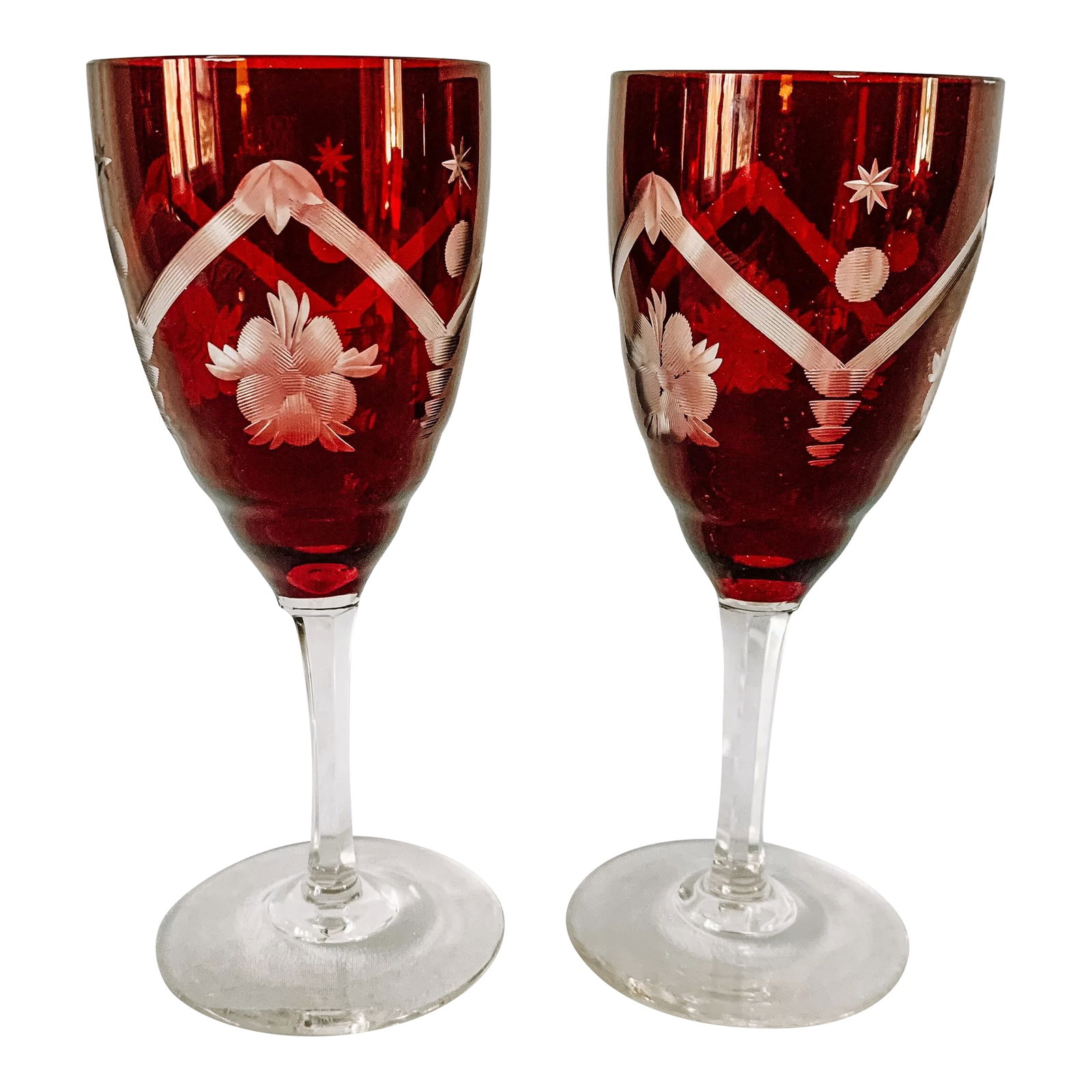 1950s Vintage Czechoslovakian Red Crystal Wine Glasses a Pair: Vintage red crystal Czechoslovakian etched wine glasses. A pair. No chips or cracks. There are some scratches on the bottom and some manufactures marks through out the glass. A few bubbles etc. Both