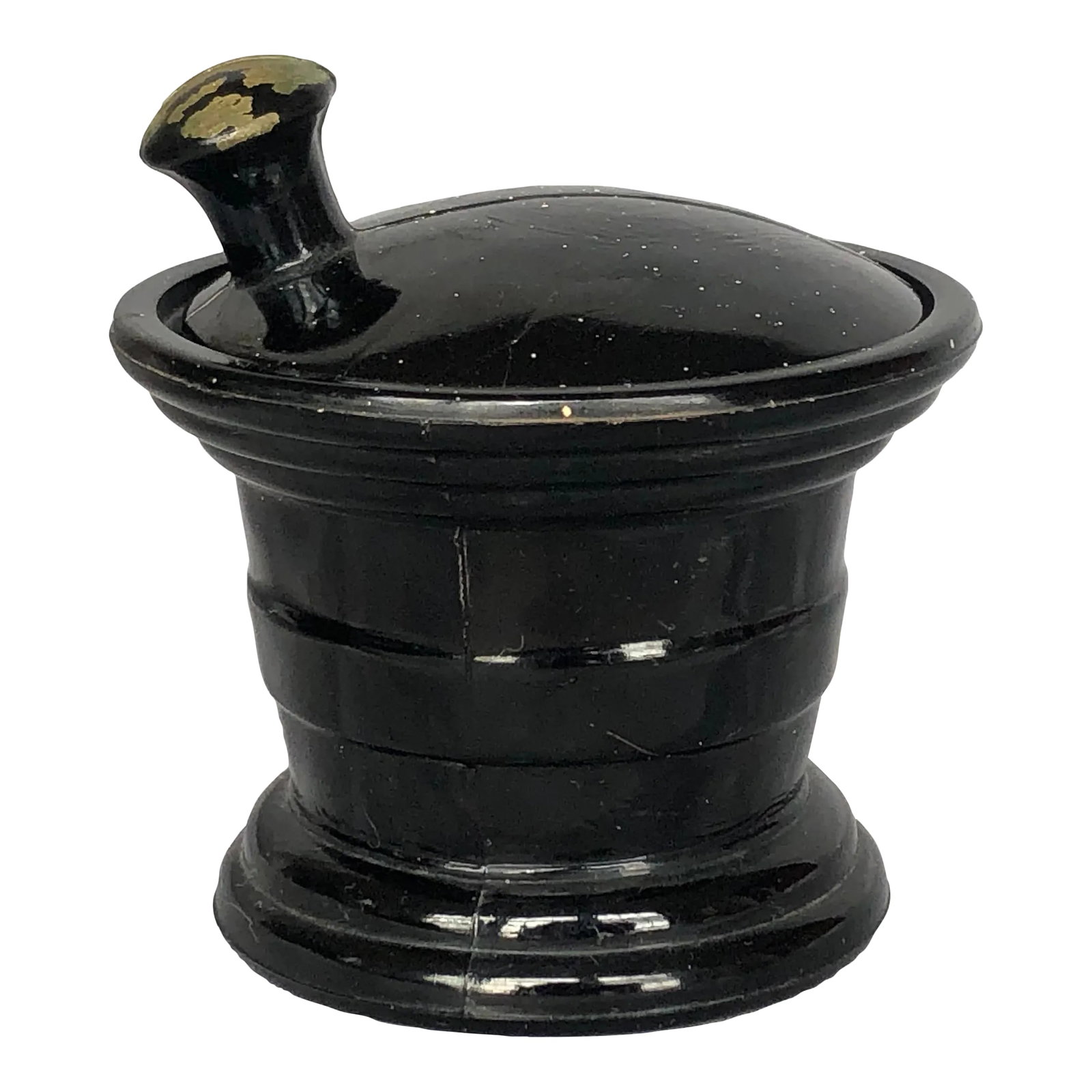 Vintage Black Glass Apothecary Jar With Lid: Molded into the shape of a mortar and pestle, this vintage black amethyst agate glass jar once held a Jean Vivadou perfume product. The vintage 1930s apothecary jar would make a practical and decorati