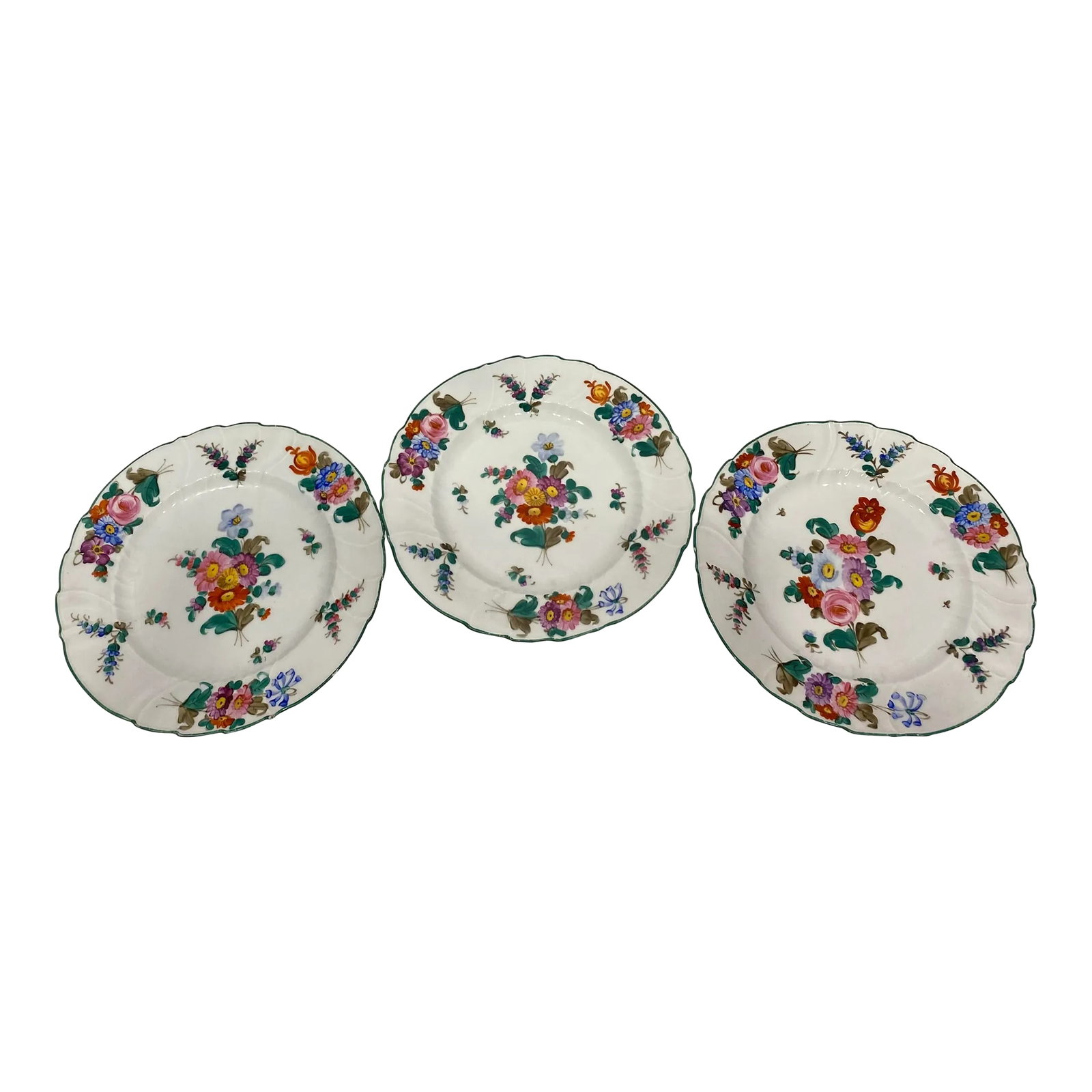 Early 1900's Hand Painted Salad or Dessert Plates, Set of 3: A lovely colorful floral design adorns this set of hand painted porcelain dishes. Two dishes have the same design, while one is slightly different. These were painted for Charles R. Lynde of Boston,