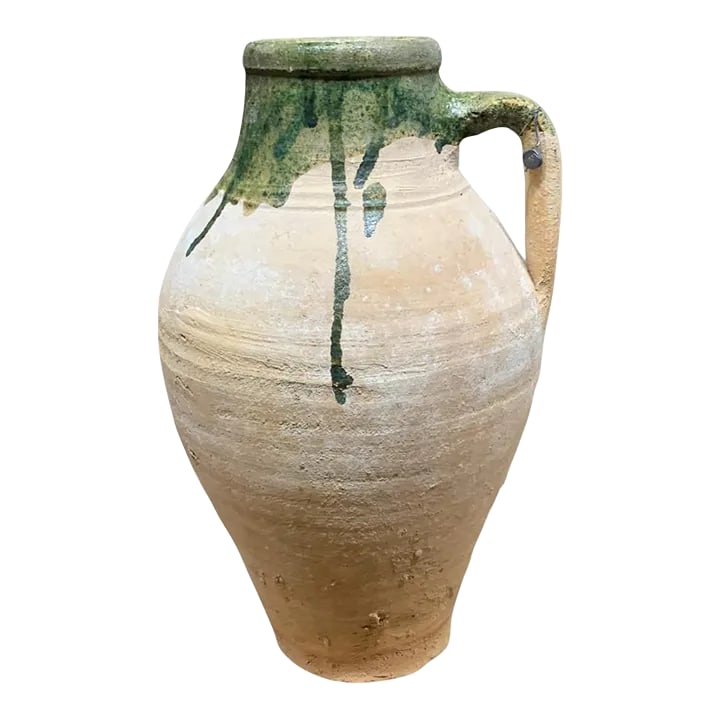 Vintage Turkish Terracotta Oil Jar: Hailing from the mountains of Anatolia and Konya in Turkey, these oil jars have a very transitional appeal. Each one is so wonderfully unique with its glaze and terra cotta color. You are buying a