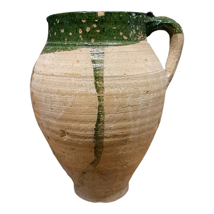 Vintage Turkish Terracotta Oil Jar: Hailing from the mountains of Anatolia and Konya in Turkey, these oil jars have a very transitional appeal. Each one is so wonderfully unique with its glaze and terra cotta color. You are buying a